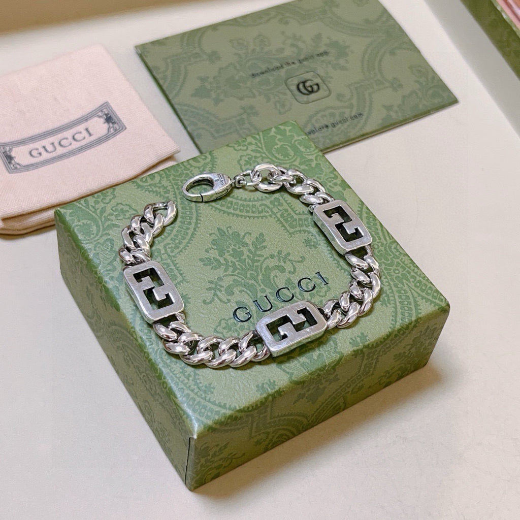 Geometric Emblem Bracelet in Polished Metal-Tone – Design 101 close-up detail