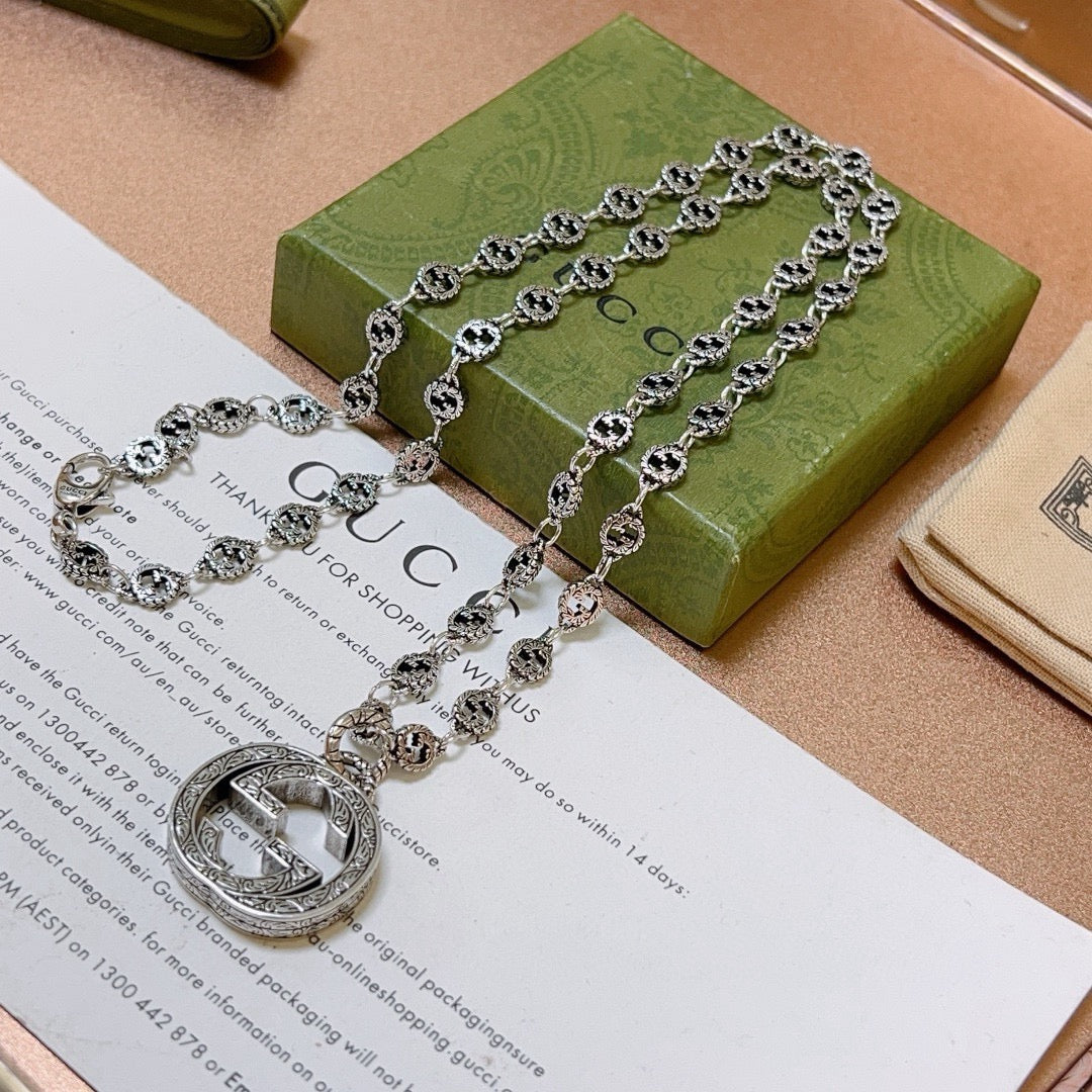 Double-G Emblem Pendant Necklace in Polished Metal-Tone – Vintage Detail – Design 023 front product view