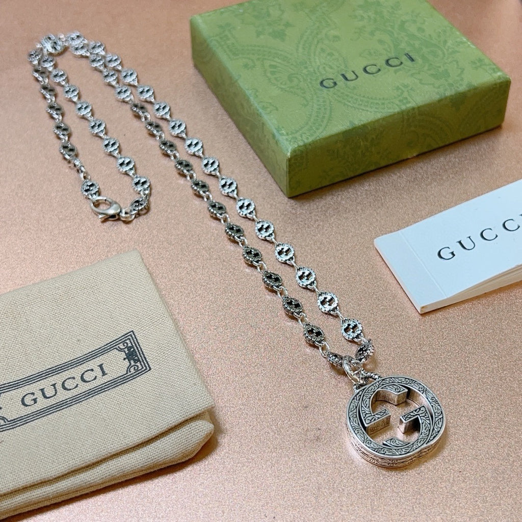 Double-G Emblem Pendant Necklace in Polished Metal-Tone – Vintage Detail – Design 056 main product view