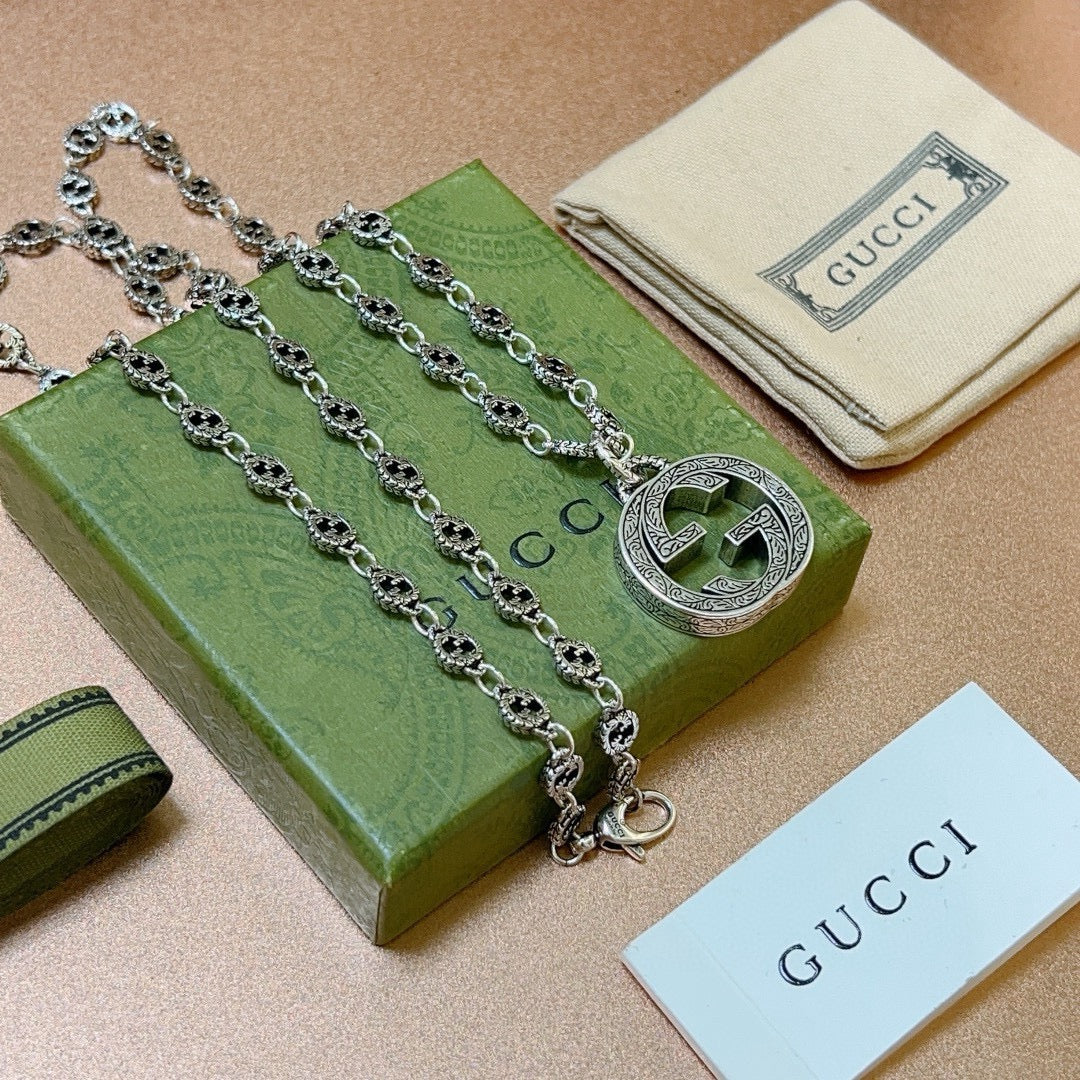 Double-G Emblem Pendant Necklace in Polished Metal-Tone – Vintage Detail – Design 056 front product view