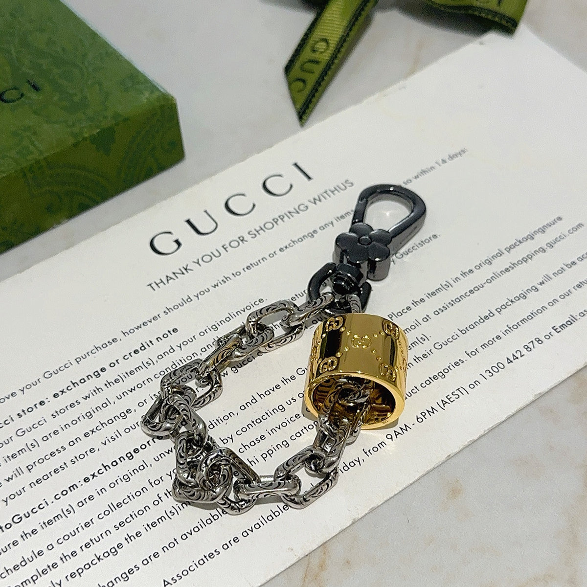 Double-G Emblem Keychain in Polished Metal-Tone – Design 053 detail view