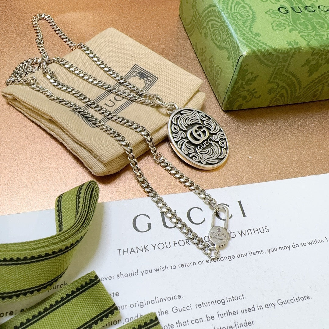 Double-G Emblem Pendant Necklace in Polished Metal-Tone – Design 093 close-up detail