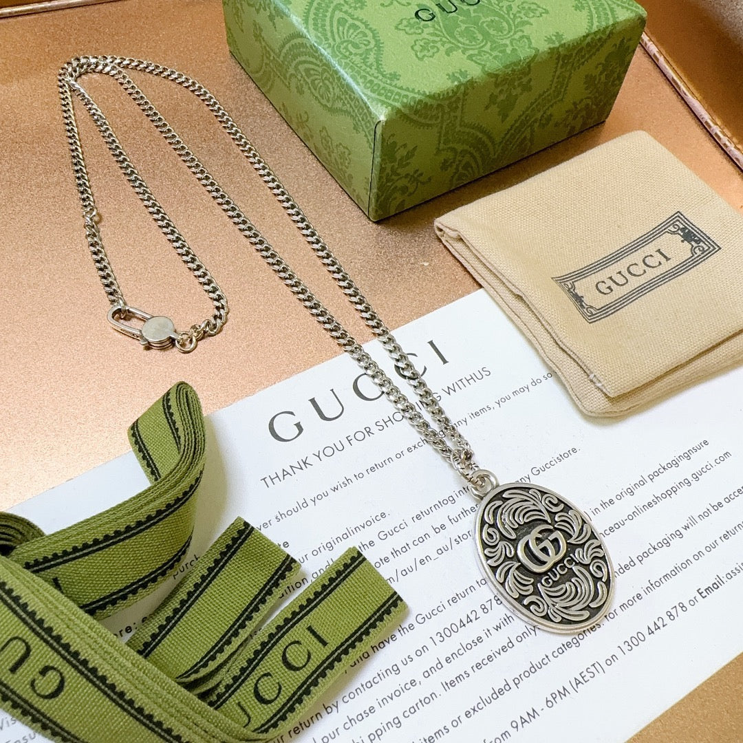 Double-G Emblem Pendant Necklace in Polished Metal-Tone – Design 093 main product view
