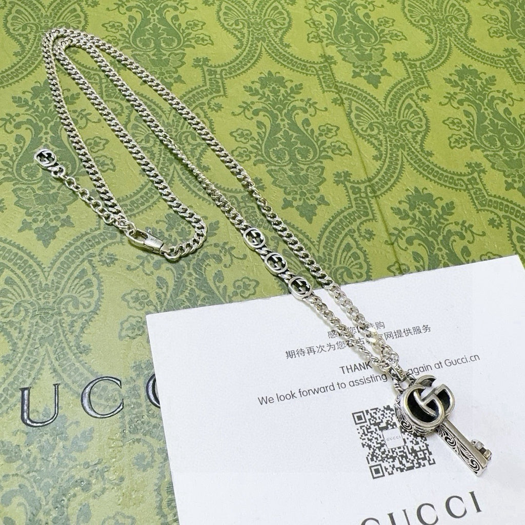 Double-G Emblem Pendant Necklace in Polished Metal-Tone – Vintage Detail – Design 022 side detail