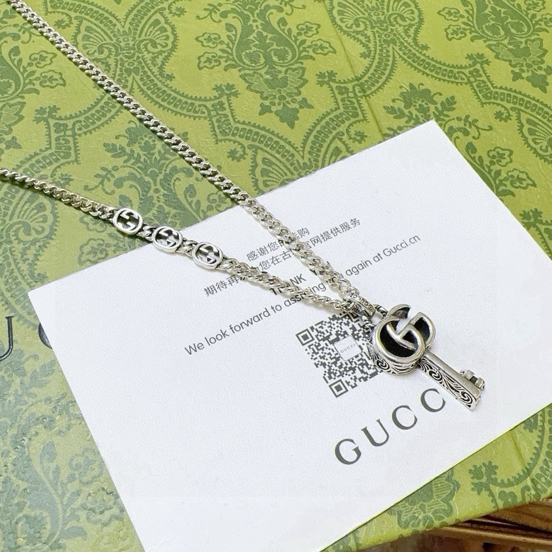 Double-G Emblem Pendant Necklace in Polished Metal-Tone – Vintage Detail – Design 022 main product view