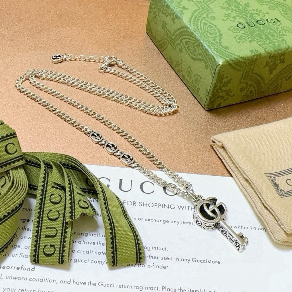 Double-G Emblem Pendant Necklace in Polished Metal-Tone – Vintage Detail – Design 058 close-up detail