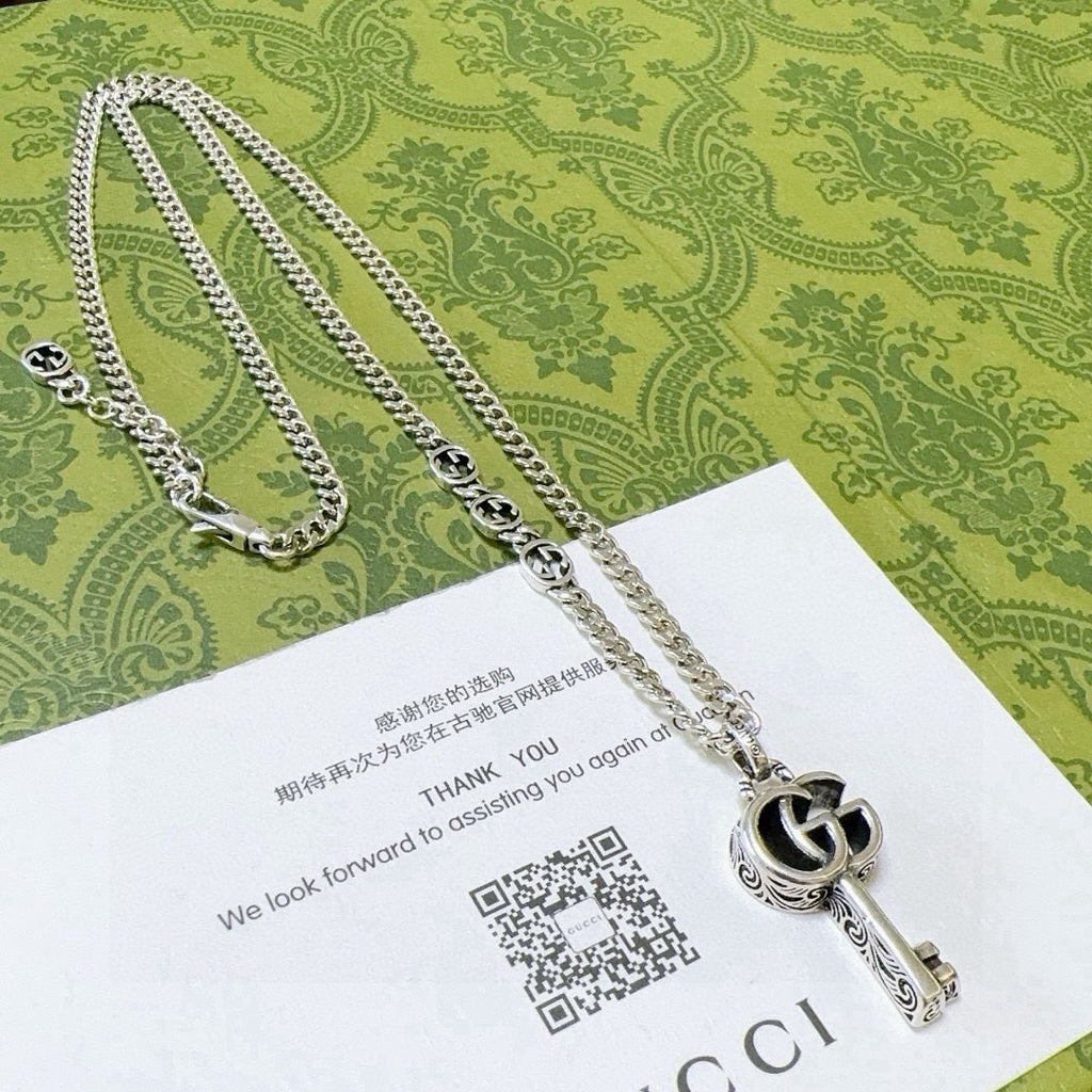 Double-G Emblem Pendant Necklace in Polished Metal-Tone – Vintage Detail – Design 058 main product view