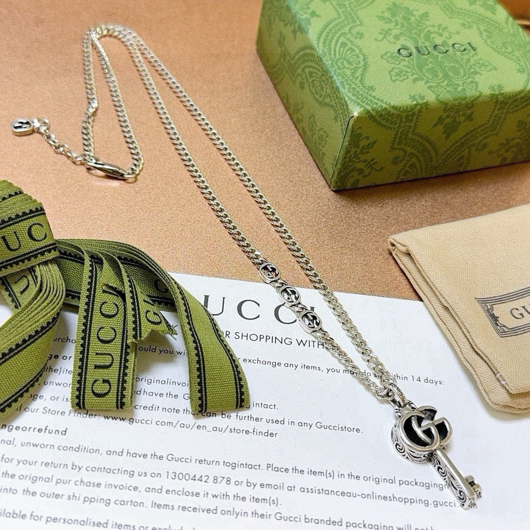 Double-G Emblem Pendant Necklace in Polished Metal-Tone – Vintage Detail – Design 022 front product view