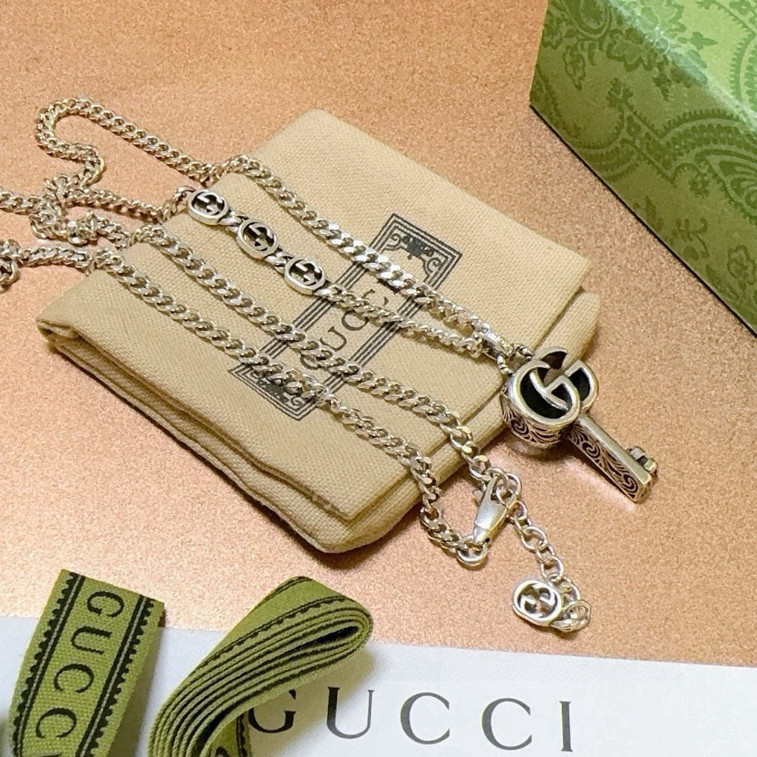 Double-G Emblem Pendant Necklace in Polished Metal-Tone – Vintage Detail – Design 058 front product view