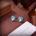 Geometric Emblem Stud Earrings in Polished Metal-Tone – Design 048 main product view