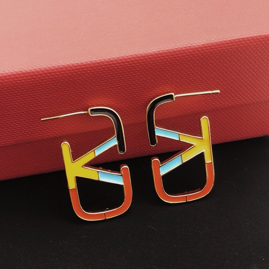 Signature Emblem Stud Earrings in Polished Metal-Tone – Design 05 front view