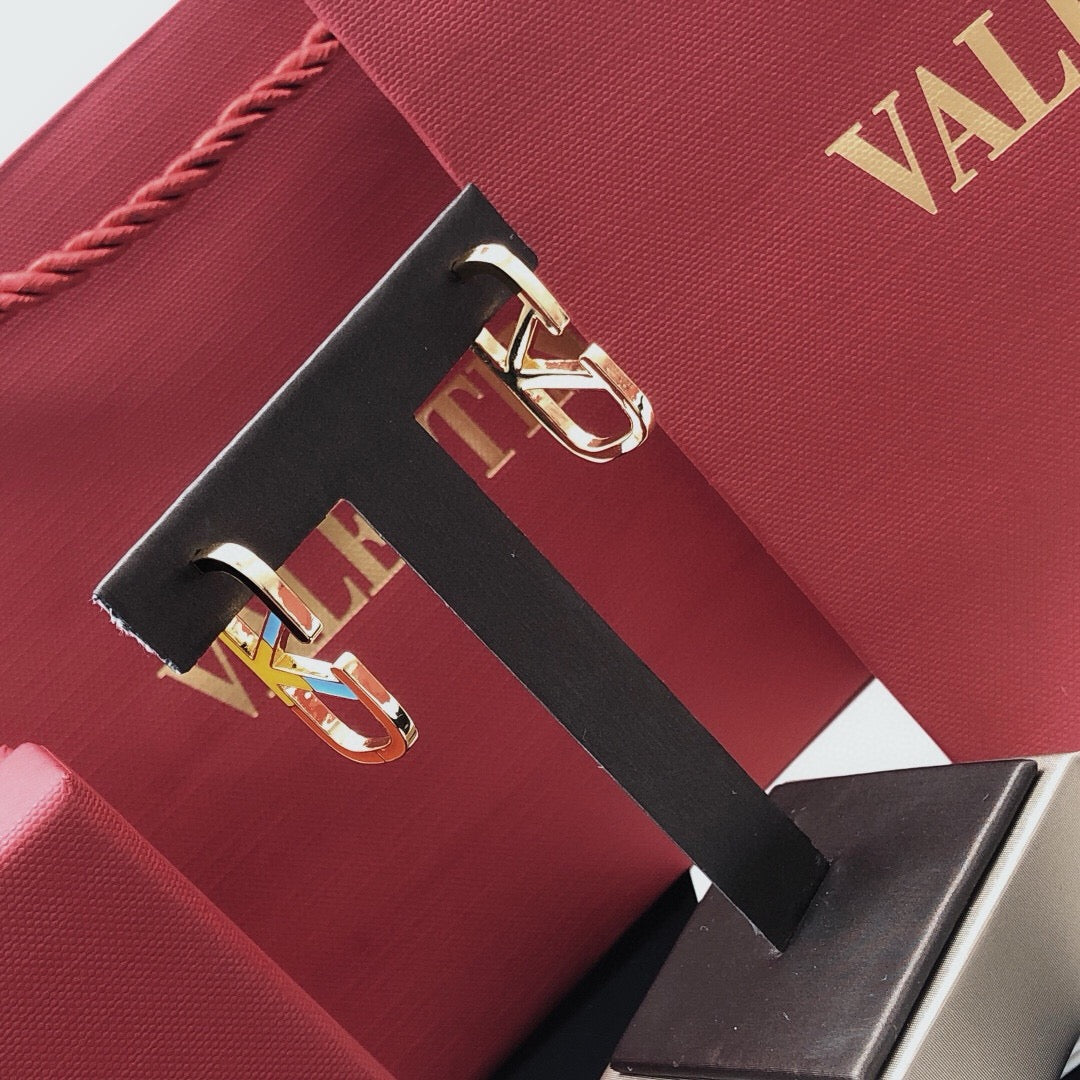 Signature Emblem Stud Earrings in Polished Metal-Tone – Design 05 styled detail