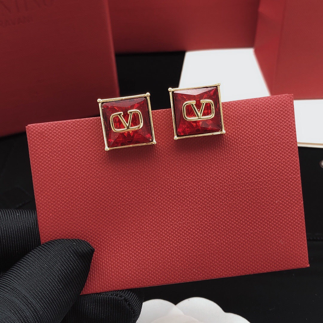 Signature Emblem Stud Earrings in Polished Metal-Tone – Red – Design 02 front view