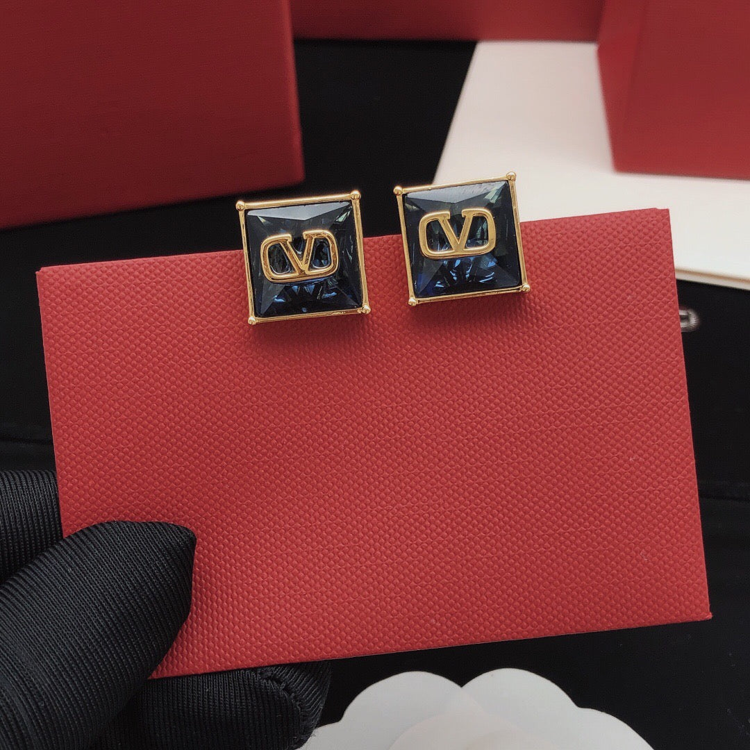Signature Emblem Stud Earrings in Polished Metal-Tone – Red main product view