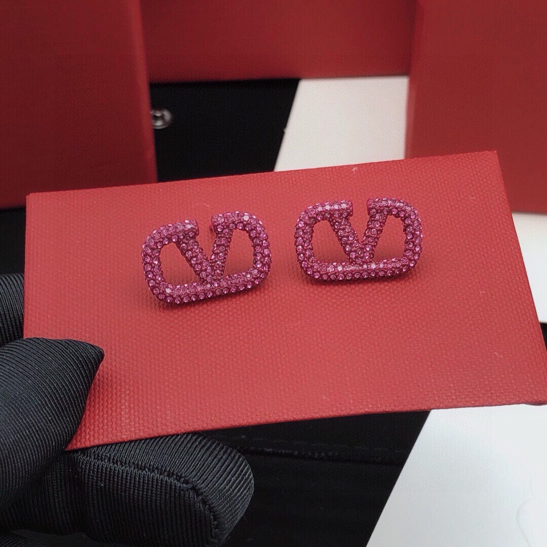 V Emblem Crystal-Accent Stud Earrings – Purple close-up view