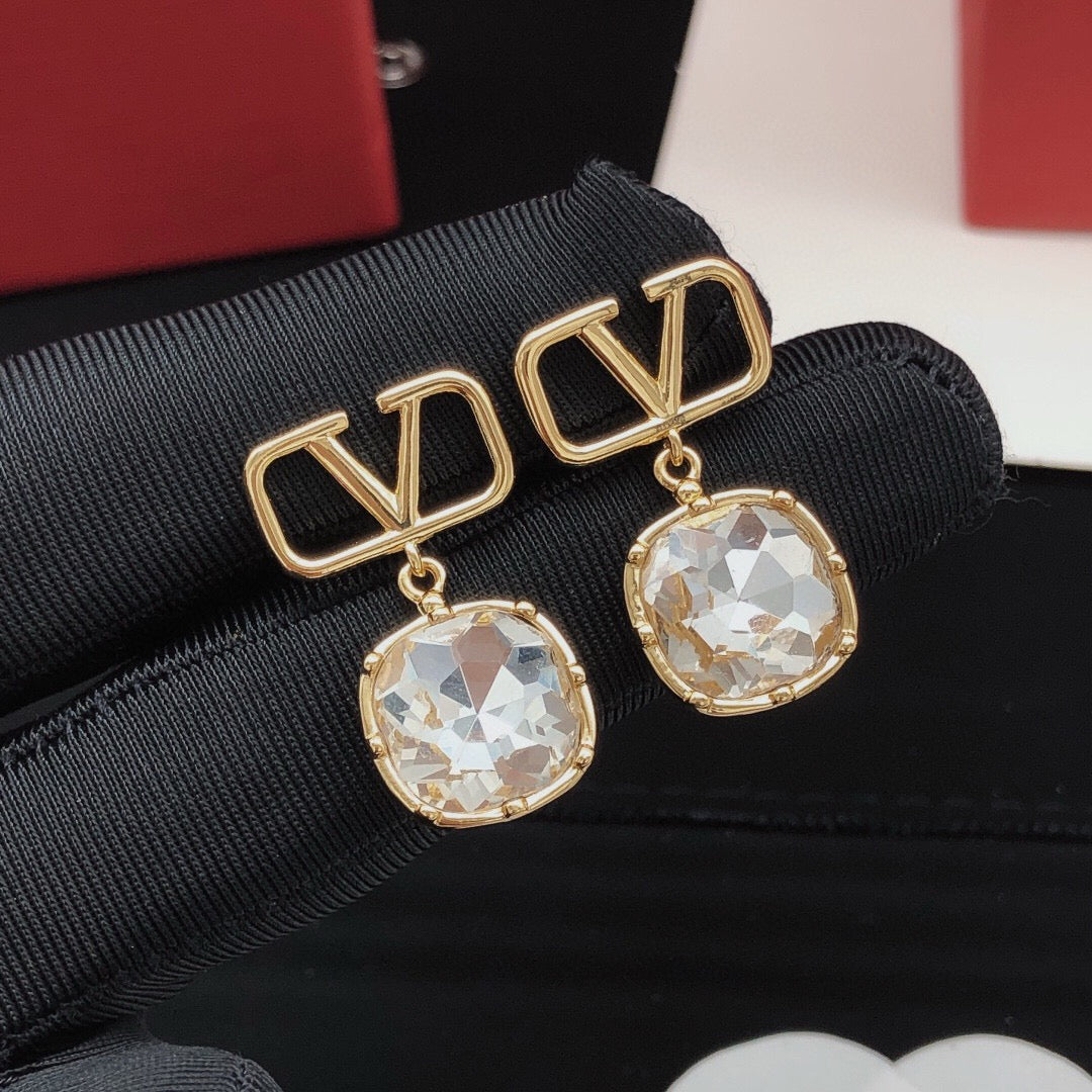 Signature Emblem Crystal-Accent Stud Earrings – Green front view