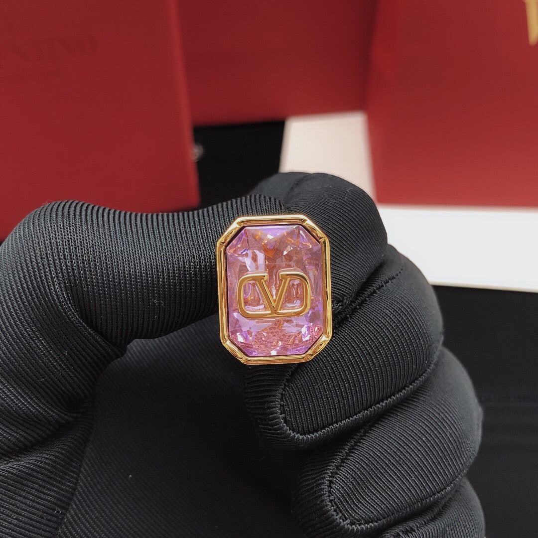 Signature Emblem Crystal-Accent Stud Earrings – Purple styled detail