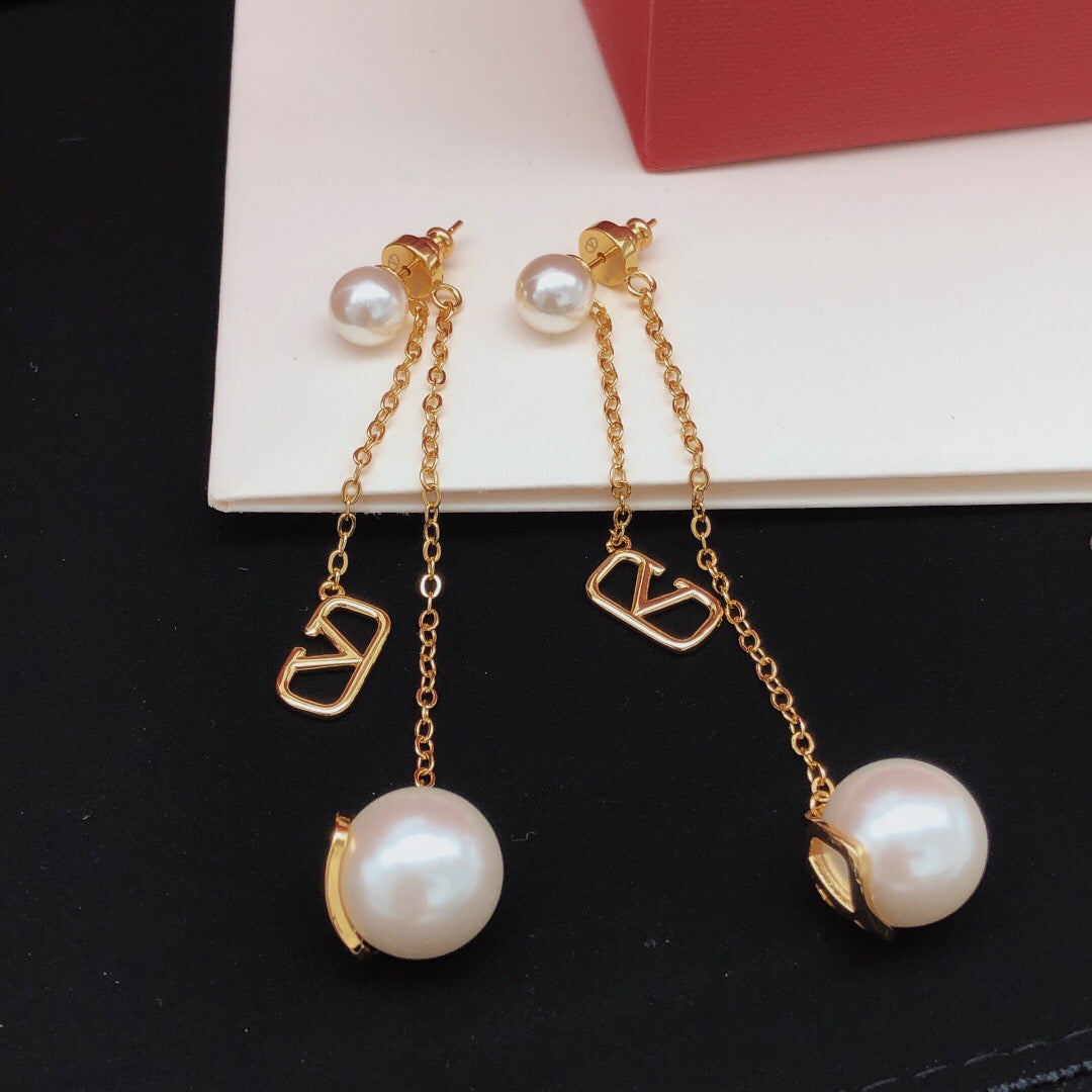 Signature Emblem Stud Earrings in Gold-Tone – Design 06 styled detail