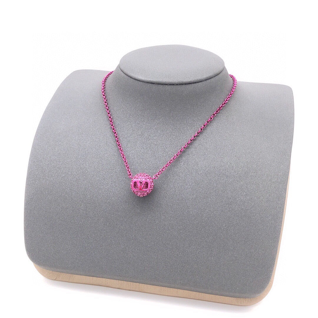 Signature Emblem Crystal-Accent Pendant Necklace – Purple front view