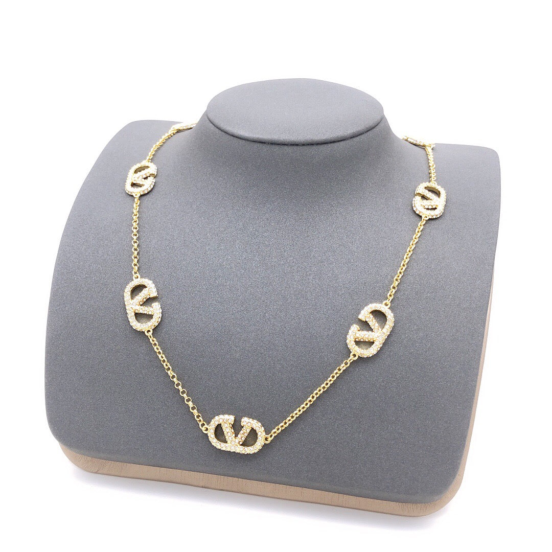 V Emblem Crystal-Accent Pendant Necklace – Design 02 styled detail