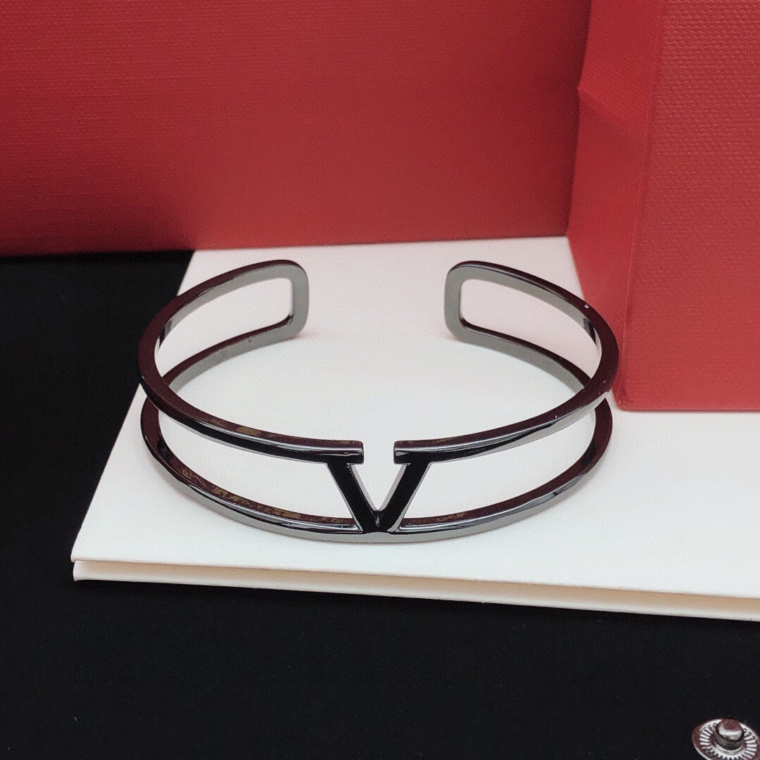 Signature Emblem Cuff Bracelet in Gold-Tone – Black front view