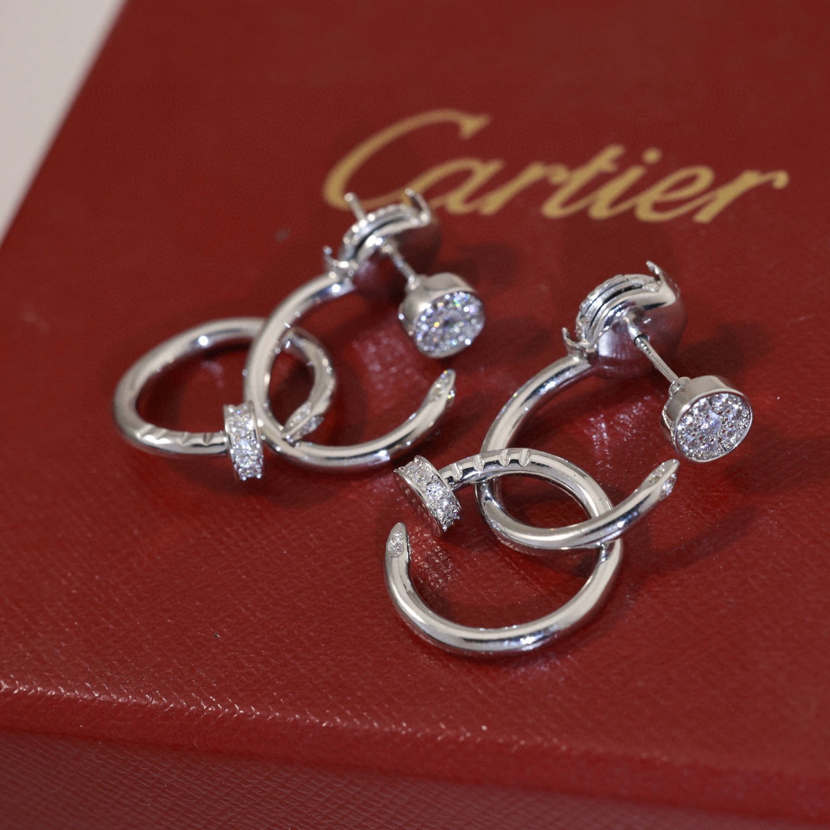 Nail Motif Stud Earrings in Silver-Tone detail view