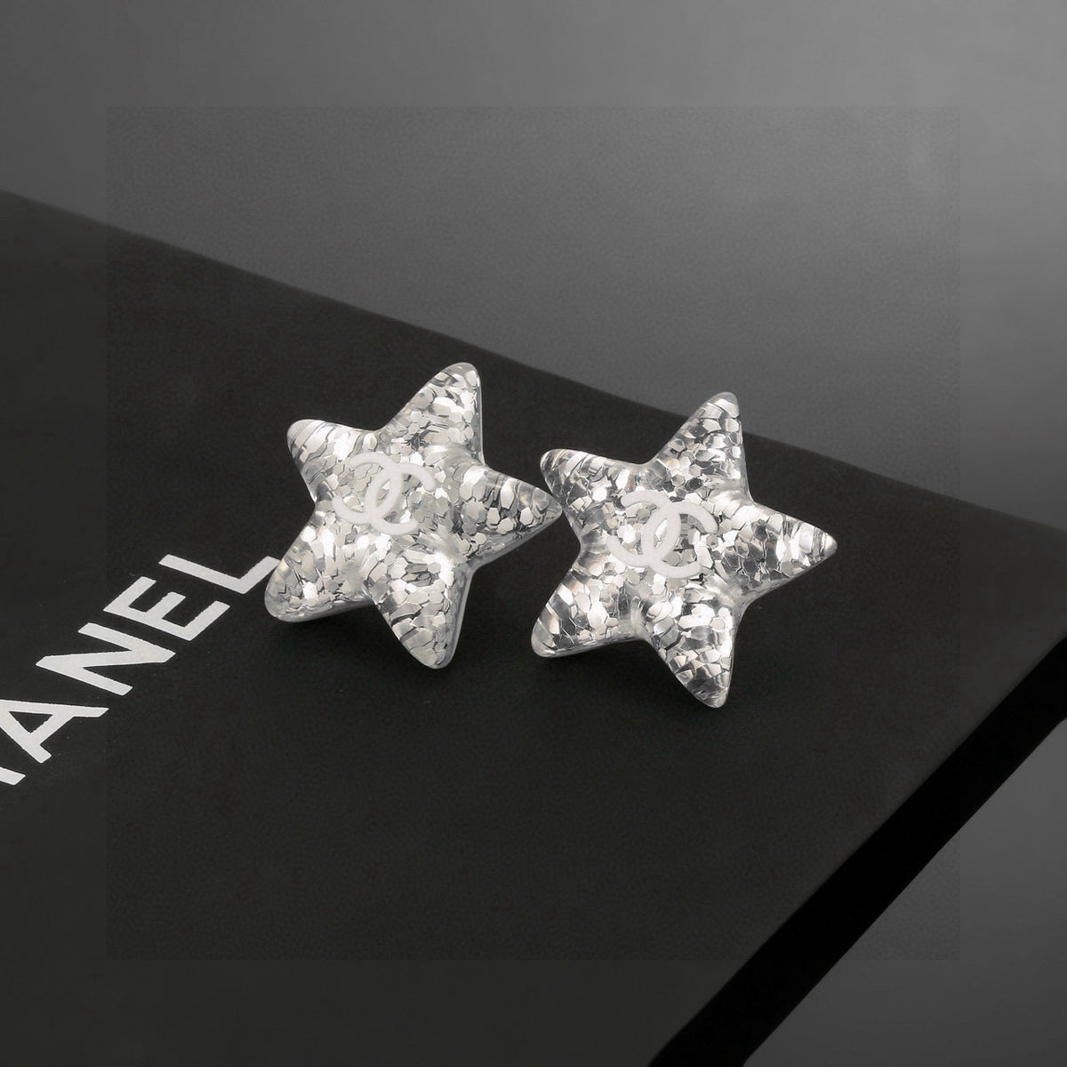 Double-C Emblem Stud Earrings in Silver-Tone – Star Detail – Design 005 front product view