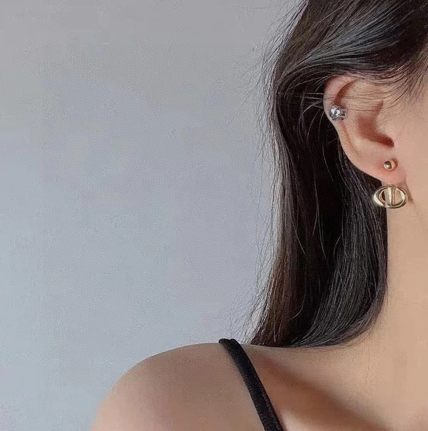 Sculptural Stud Earrings in Polished Metal-Tone – Design 020 detail view