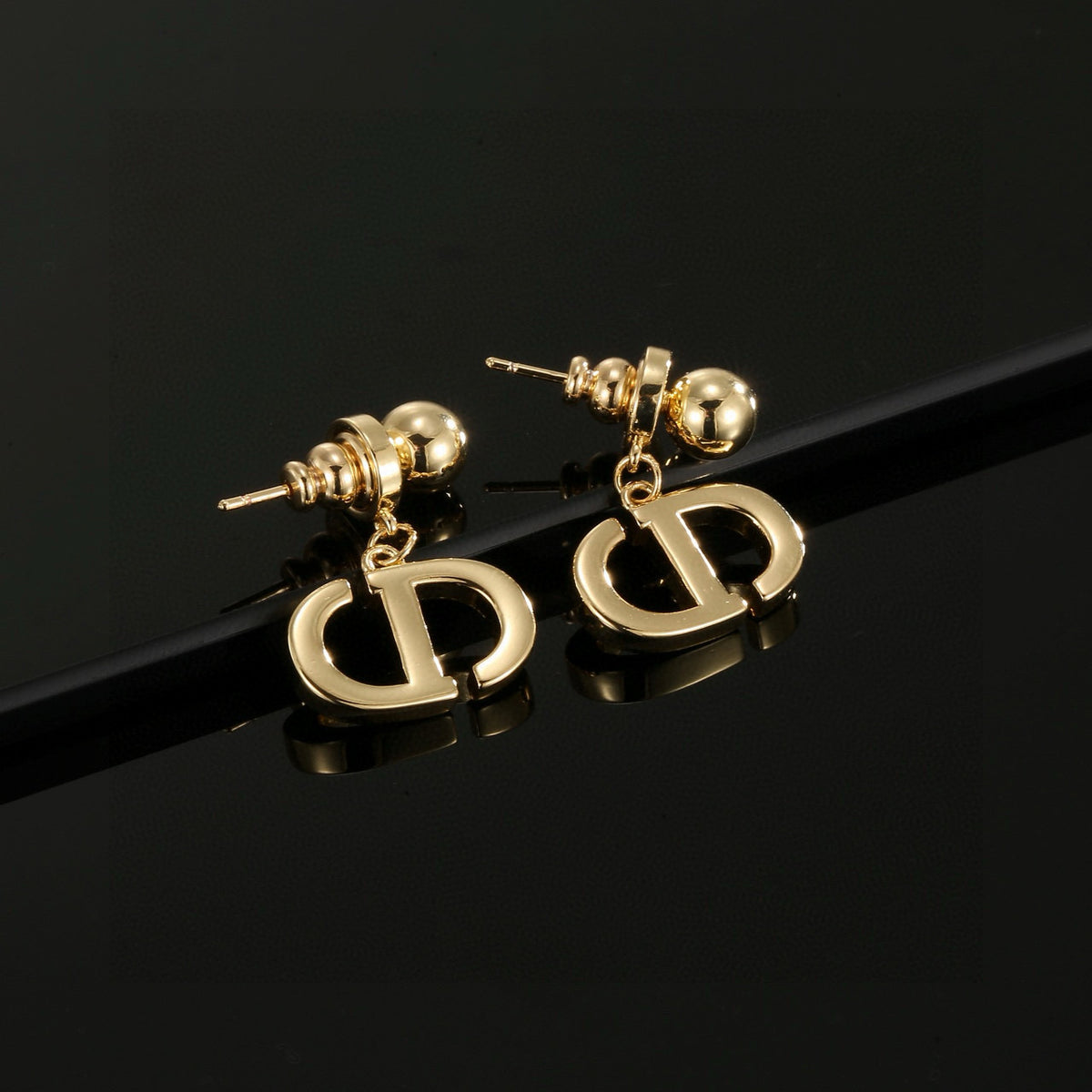 Sculptural Stud Earrings in Polished Metal-Tone – Design 010 styled view