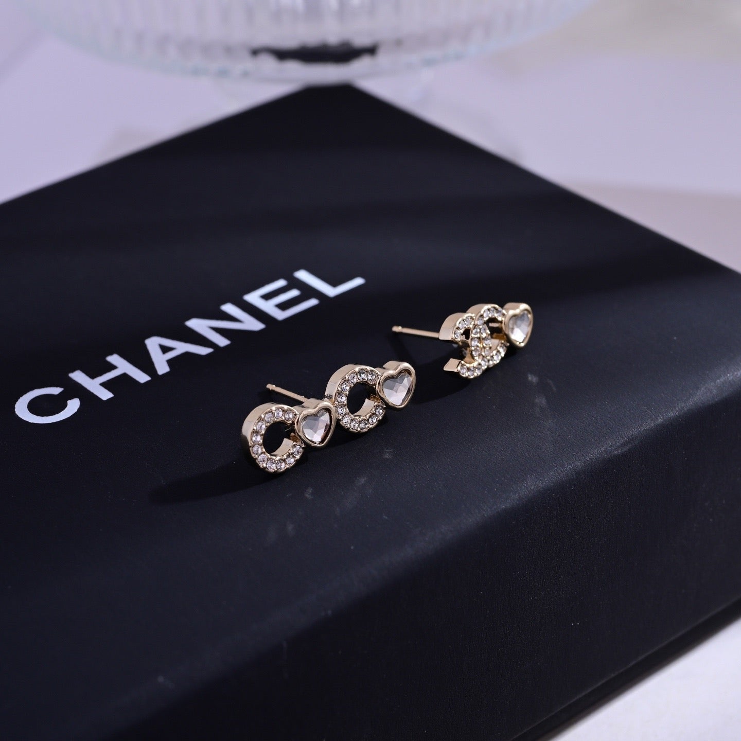 Signature Emblem Stud Earrings in Polished Metal-Tone – Design 107 front product view