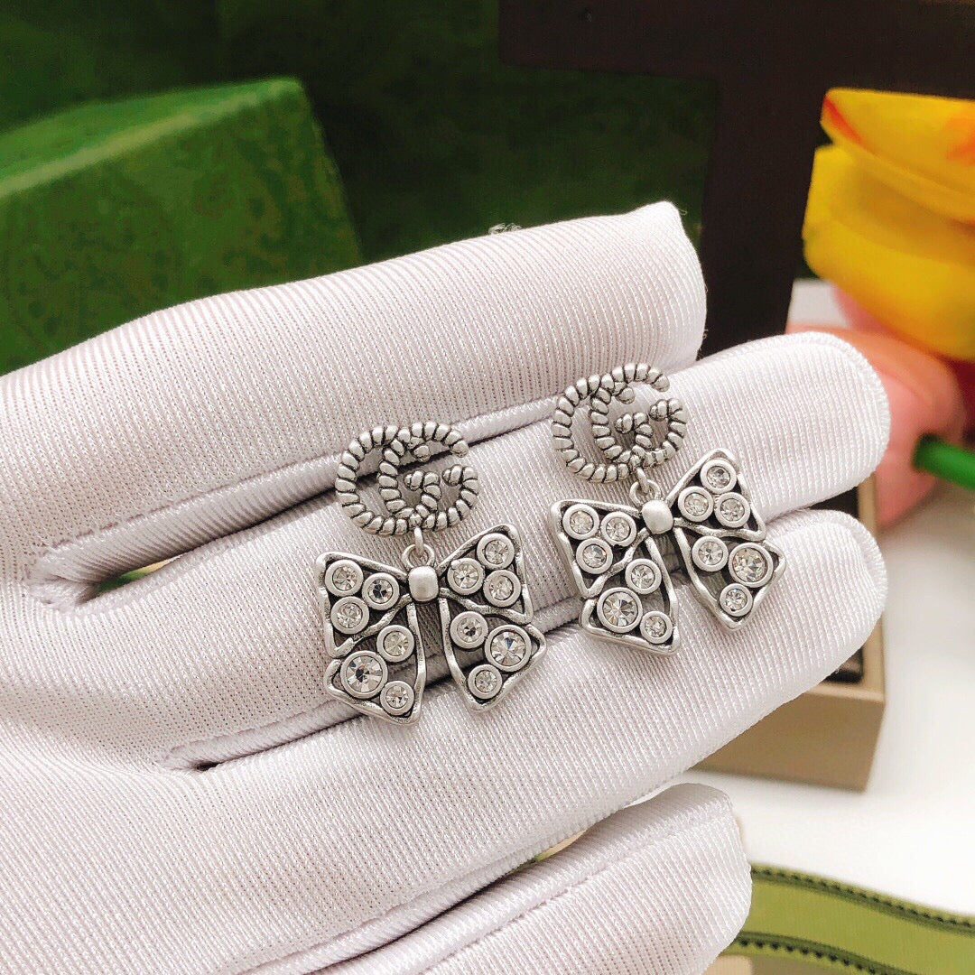 Double-G Emblem Statement Earrings in Silver-Tone – Design 002 styled product view