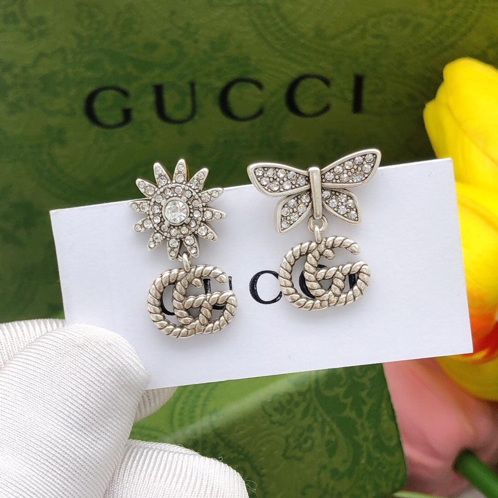 Double-G Emblem Stud Earrings in Polished Metal-Tone – Design 028 main product view