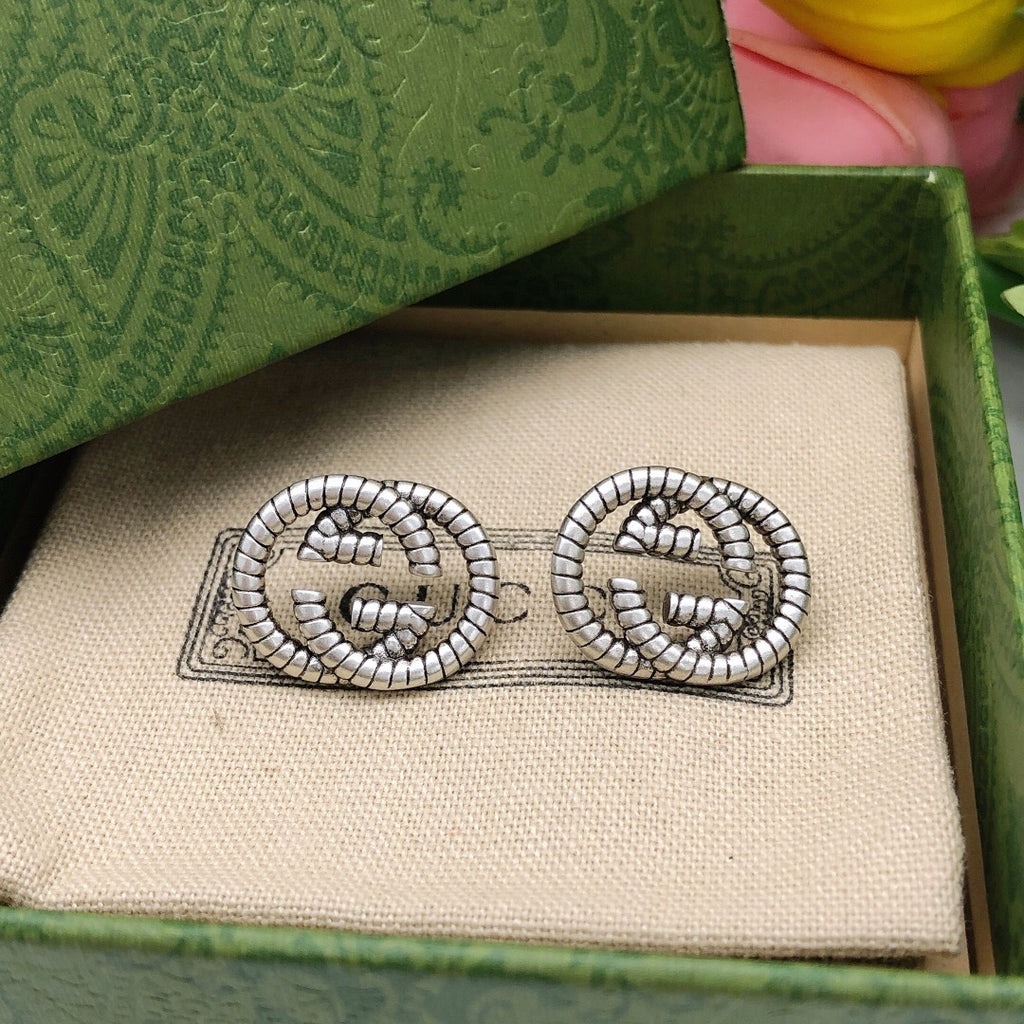 Double-G Emblem Stud Earrings in Silver-Tone – Design 003 close-up detail