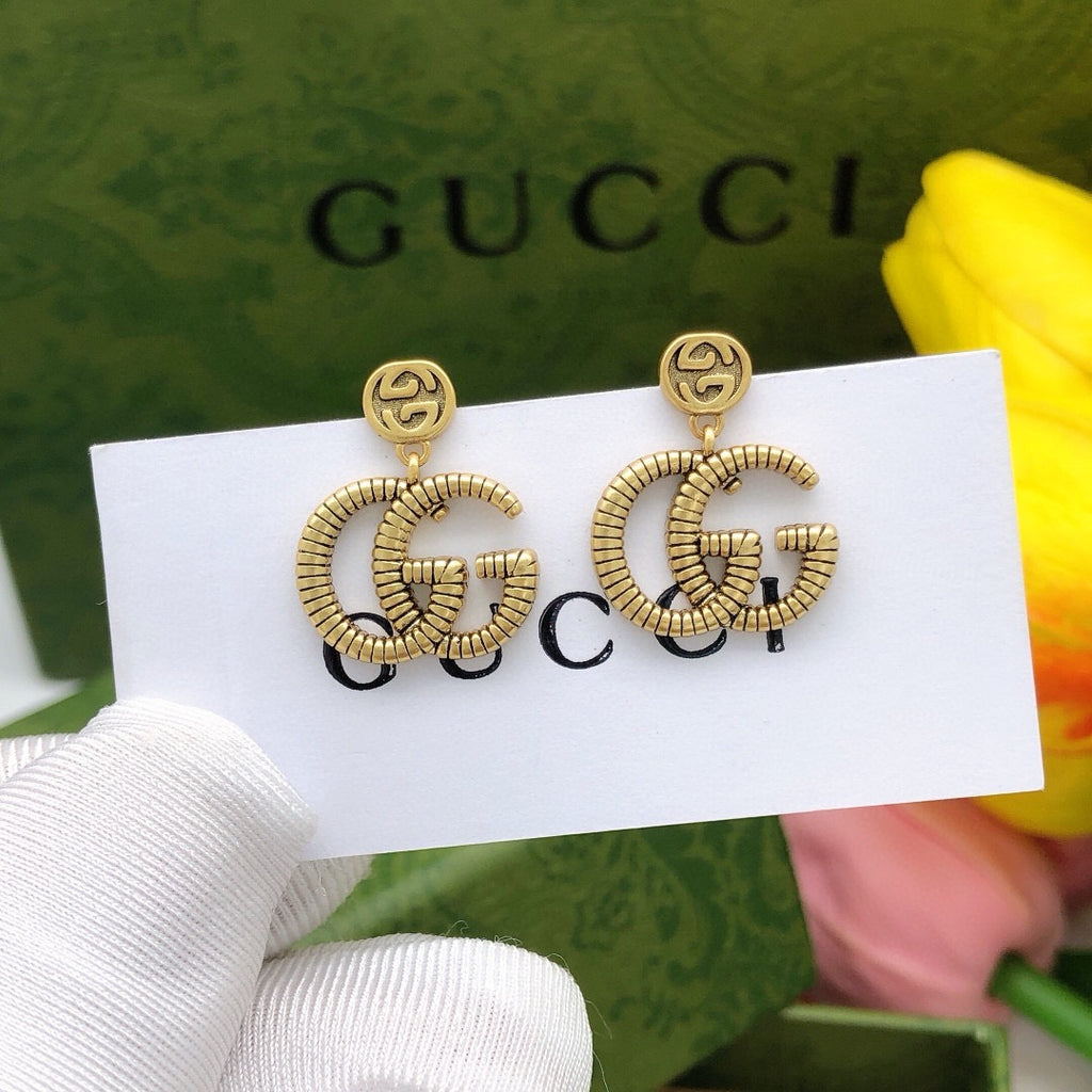 Double-G Emblem Stud Earrings in Polished Metal-Tone – Design 026 main product view