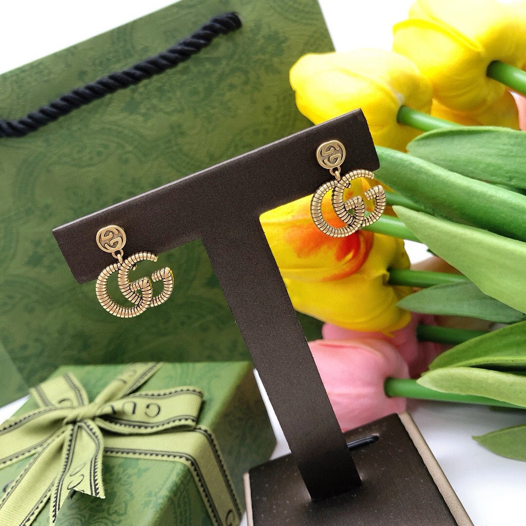 Double-G Emblem Stud Earrings in Polished Metal-Tone – Design 026 main product view