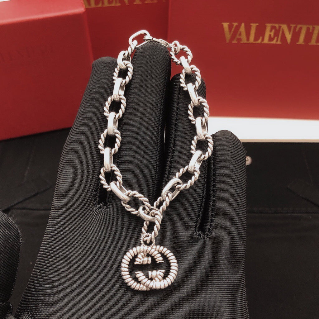 Geometric Emblem Bracelet in Silver-Tone – Vintage Detail detail view
