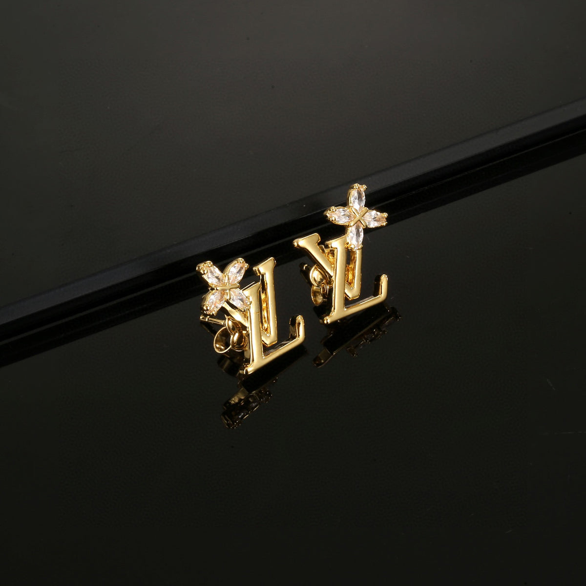 Geometric Emblem Stud Earrings in Polished Metal-Tone – Design 031 front product view