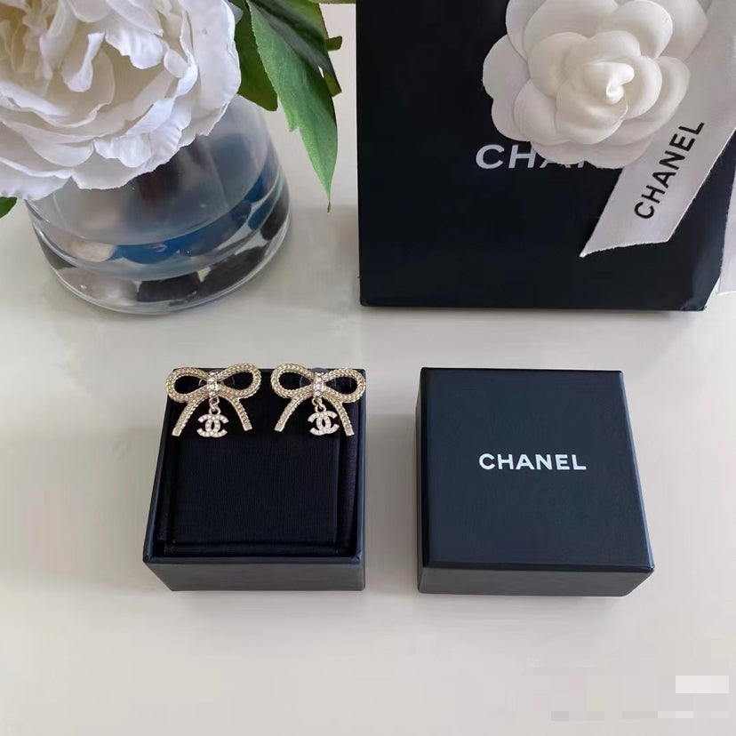 Double-C Emblem Stud Earrings in Polished Metal-Tone – Design 306 front product view