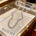 Double-G Emblem Pendant Necklace in Polished Metal-Tone – Vintage Detail – Design 036 main product view
