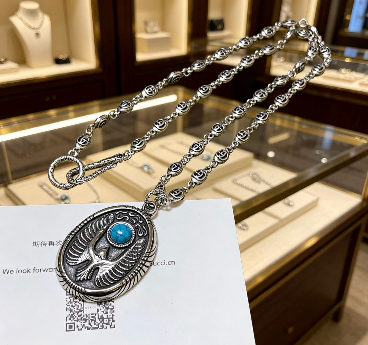 Double-G Emblem Pendant Necklace in Polished Metal-Tone – Design 251 detail view