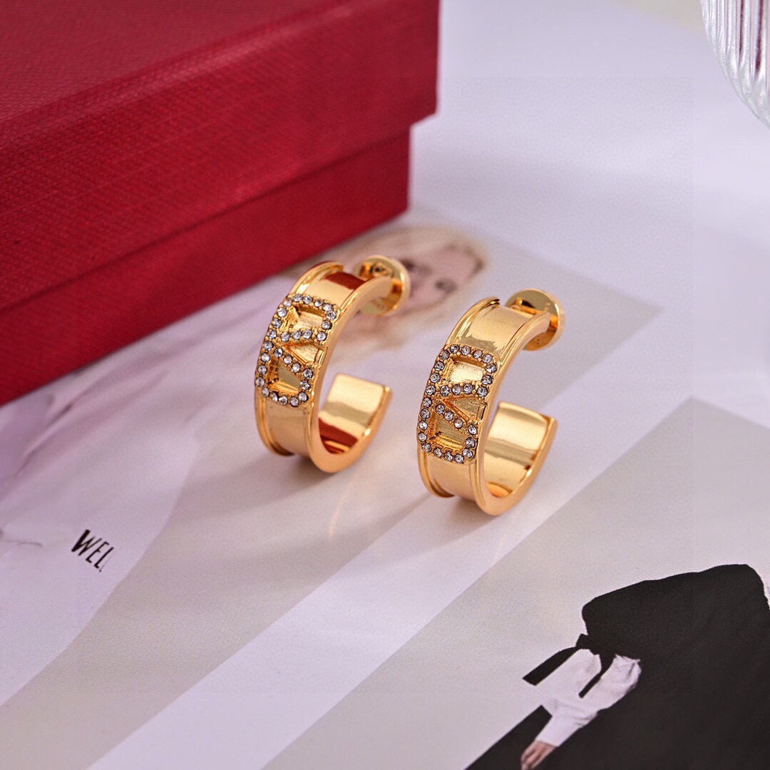 Signature Emblem Stud Earrings in Gold-Tone – Design 21 front view