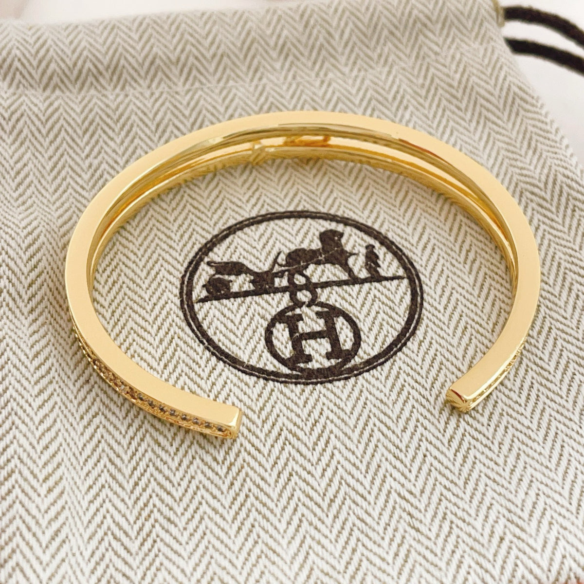 Geometric Emblem Bangle in Gold-Tone – Gold Detail close-up detail