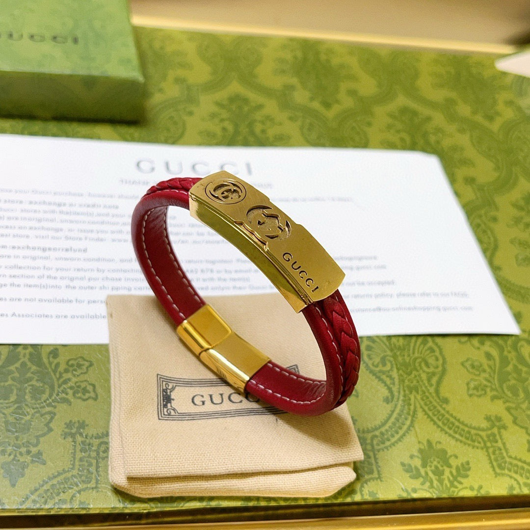 Double-G Emblem Bangle in Polished Metal-Tone – Leather Detail close-up detail