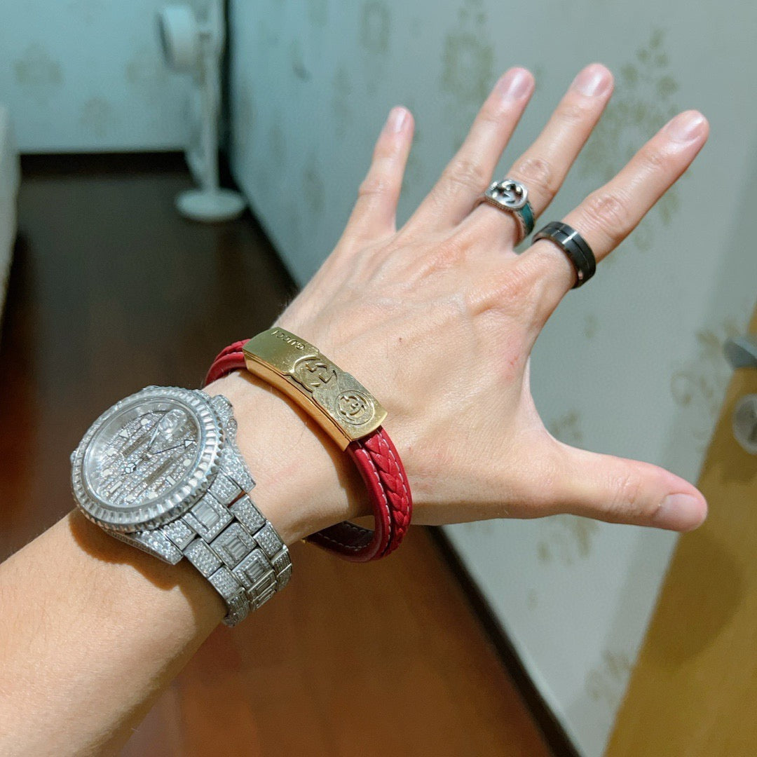 Double-G Emblem Bangle in Polished Metal-Tone – Leather Detail – Design 002 detail view