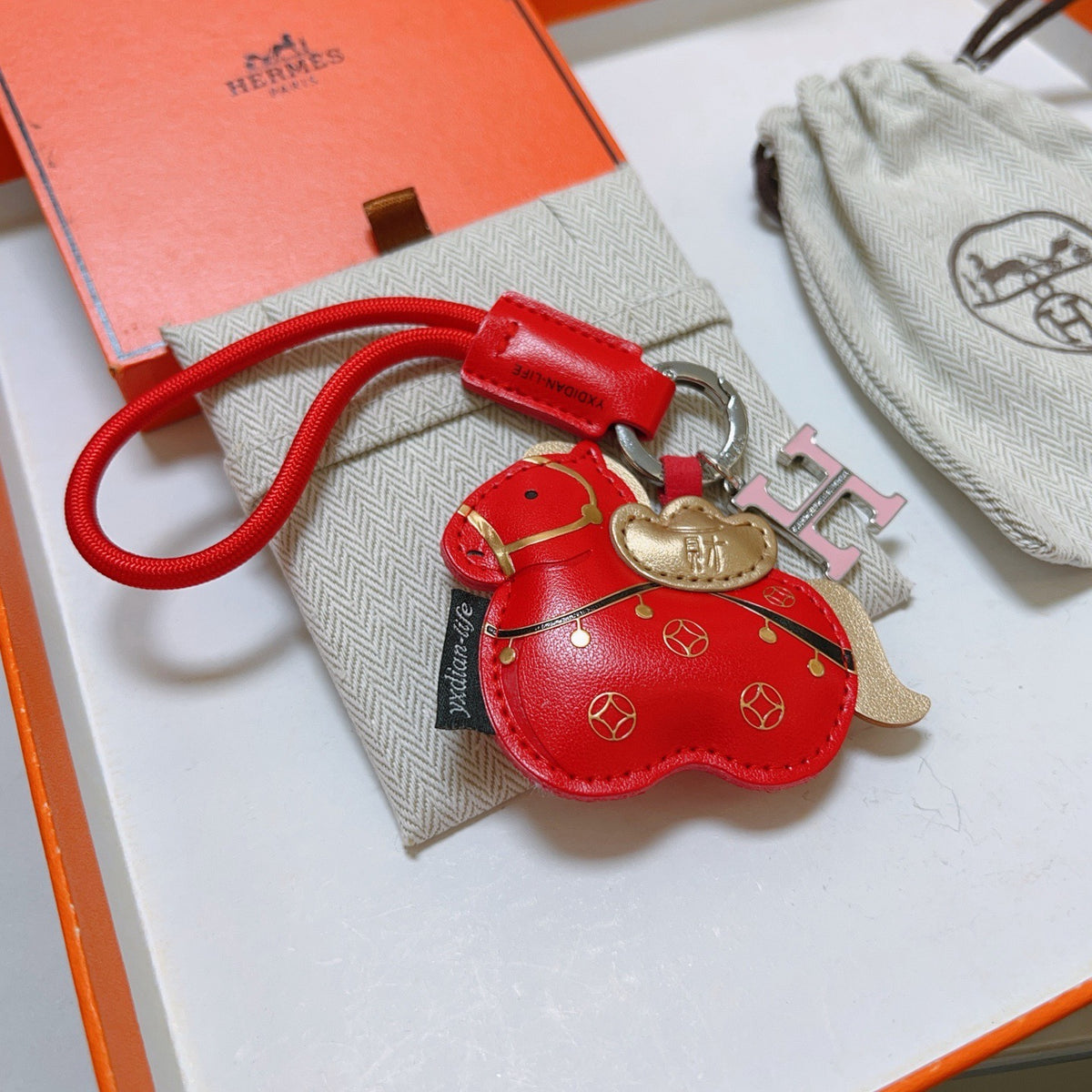 Martin Graham keychain in polished metal-tone – front product view