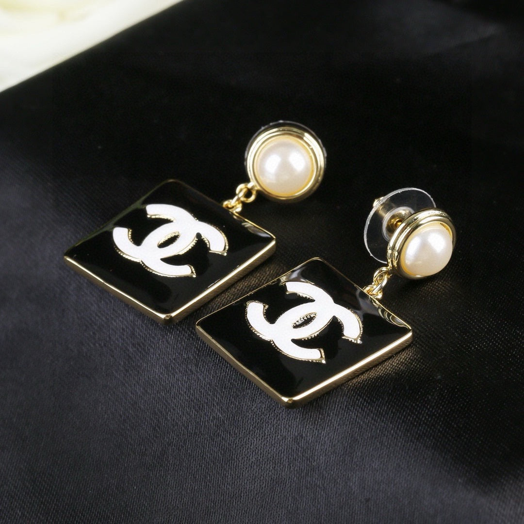 Signature Emblem Statement Earrings in Polished Metal-Tone – Design 001 close-up detail