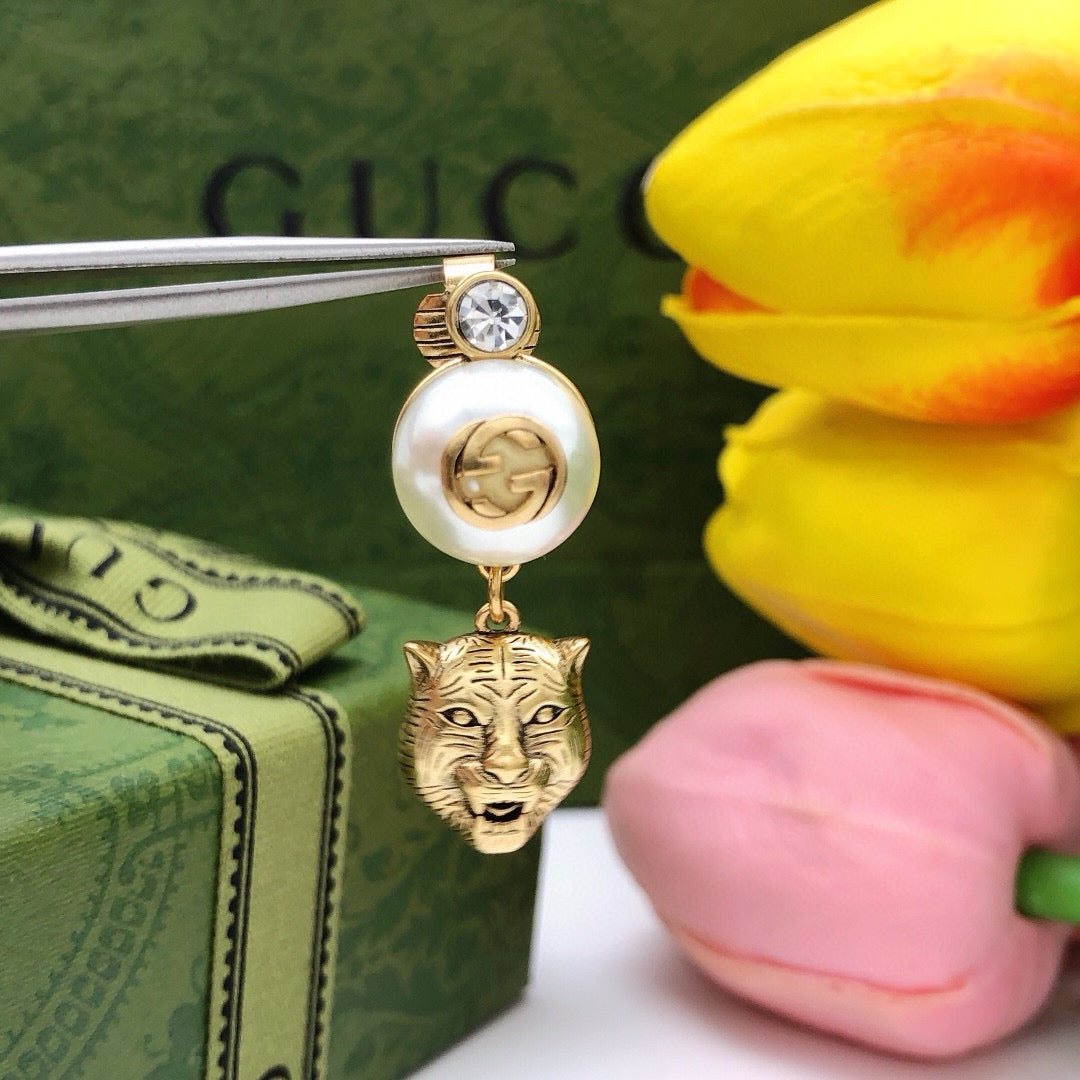 Tiger Head Statement Earrings in Polished Metal-Tone styled product view
