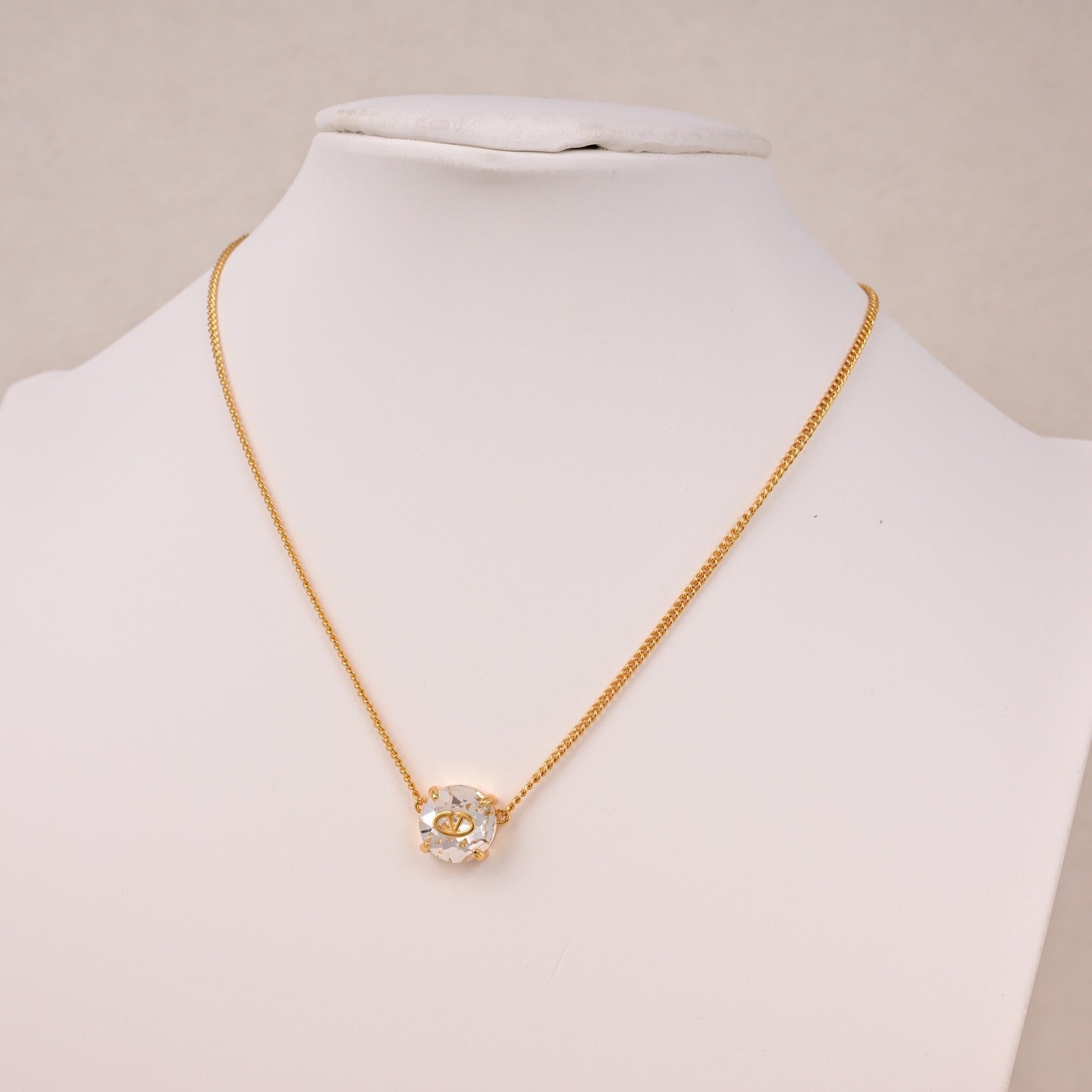 Signature Emblem Pendant Necklace in Polished Metal-Tone – Design 10 close-up view