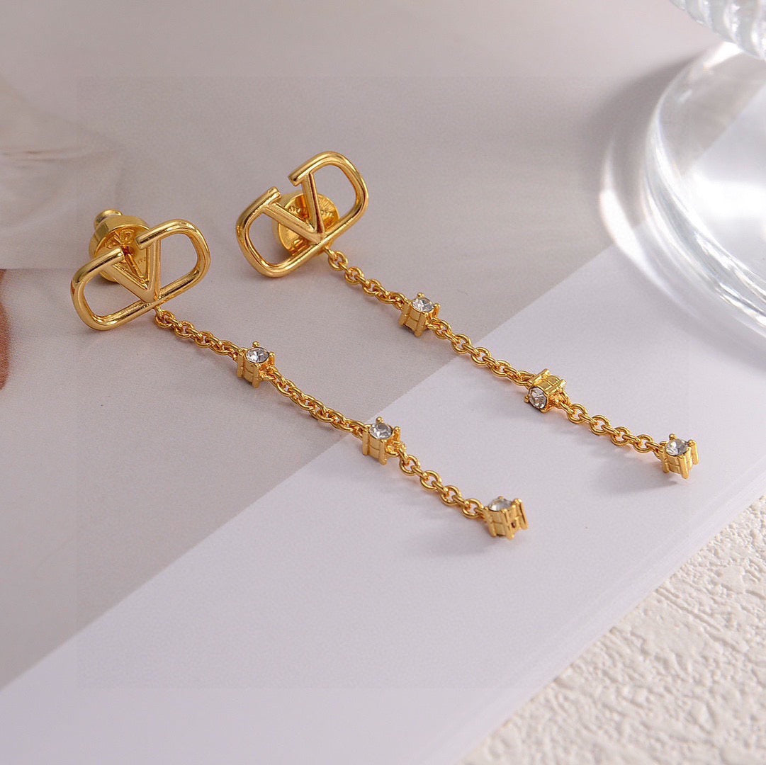 Signature Emblem Stud Earrings in Gold-Tone – Design 23 styled detail