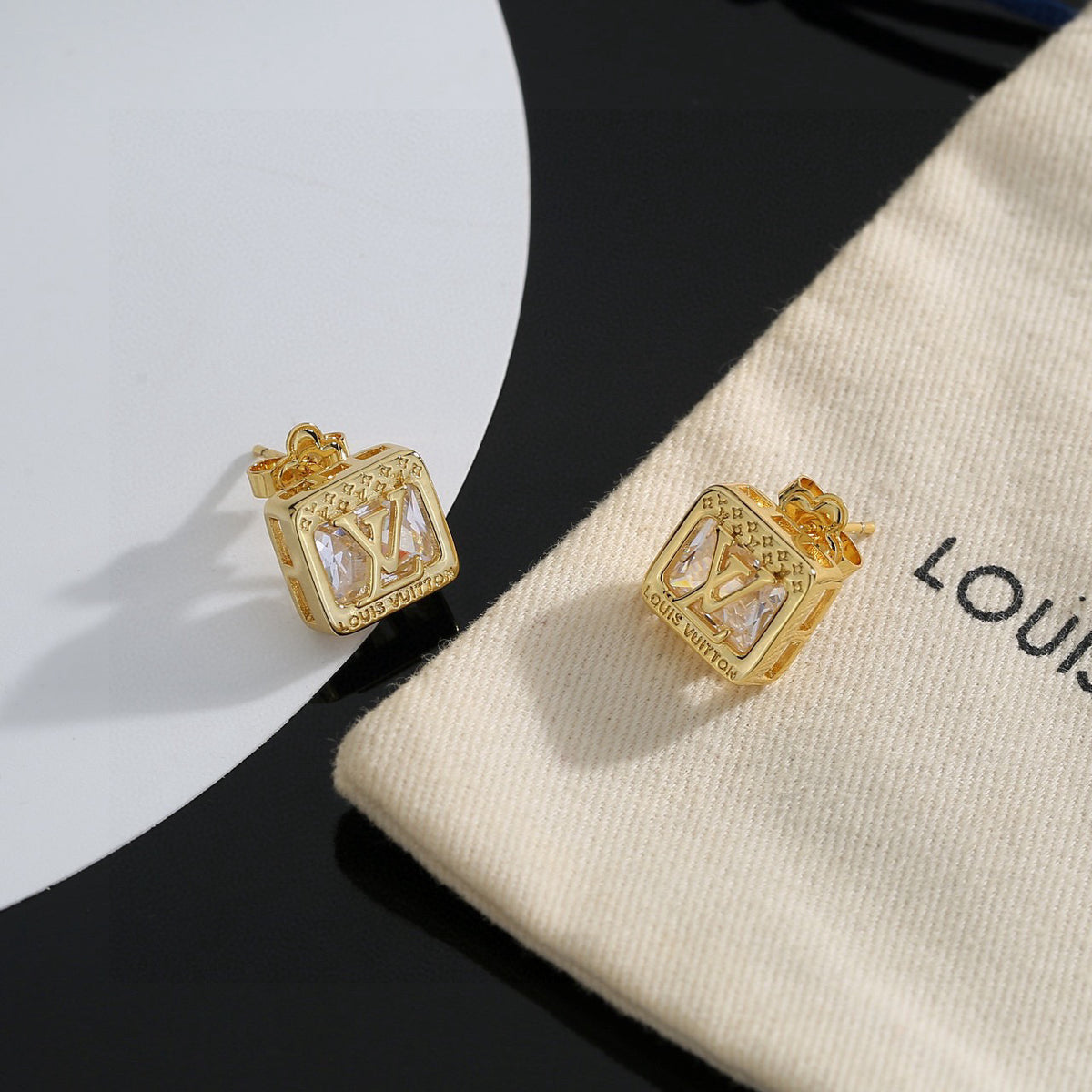 Martin Graham stud earrings in polished metal-tone – side detail